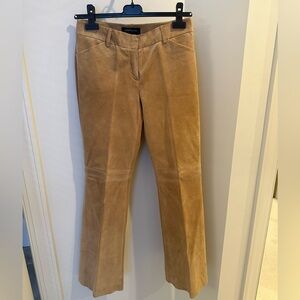 Camel color suede pants, low waisted.